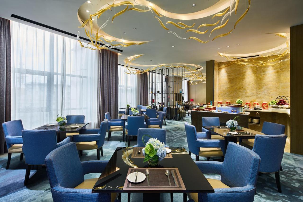 Wanda Realm Qiqihar Hotel Bagian luar foto