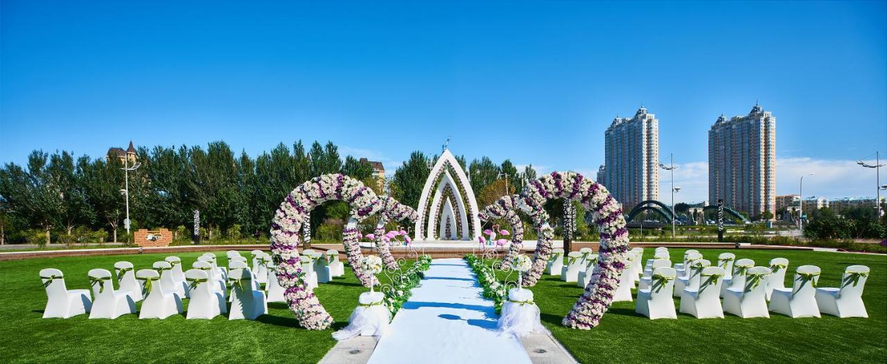 Wanda Realm Qiqihar Hotel Bagian luar foto