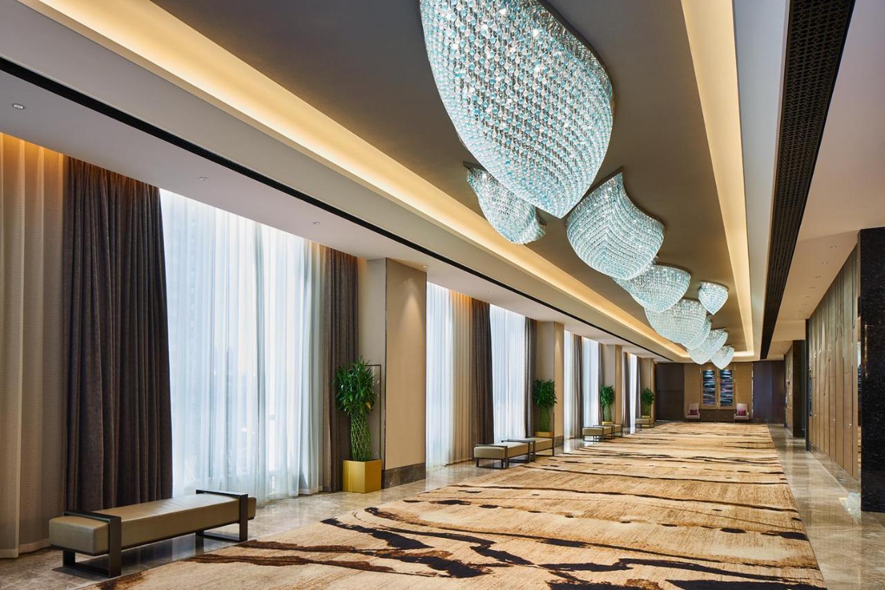 Wanda Realm Qiqihar Hotel Bagian luar foto