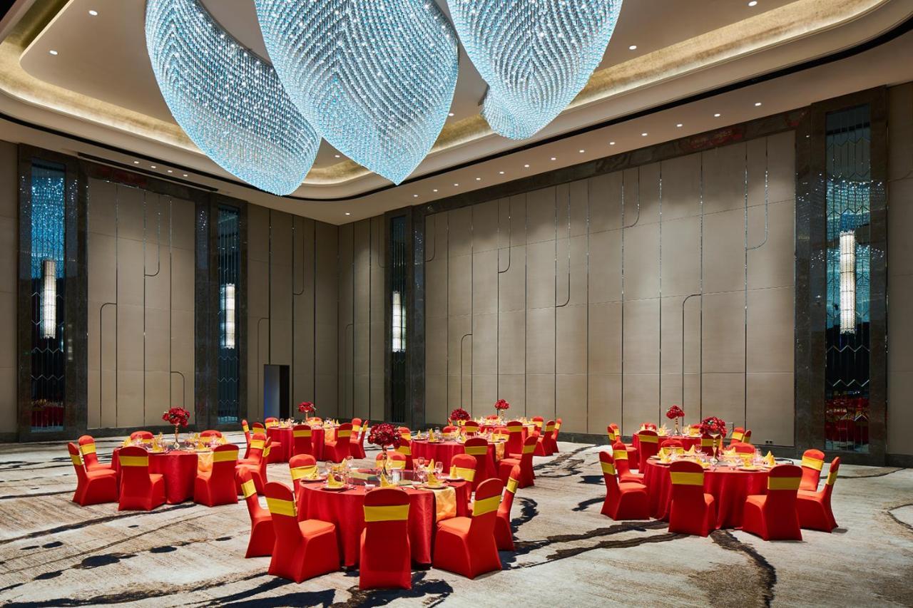 Wanda Realm Qiqihar Hotel Bagian luar foto