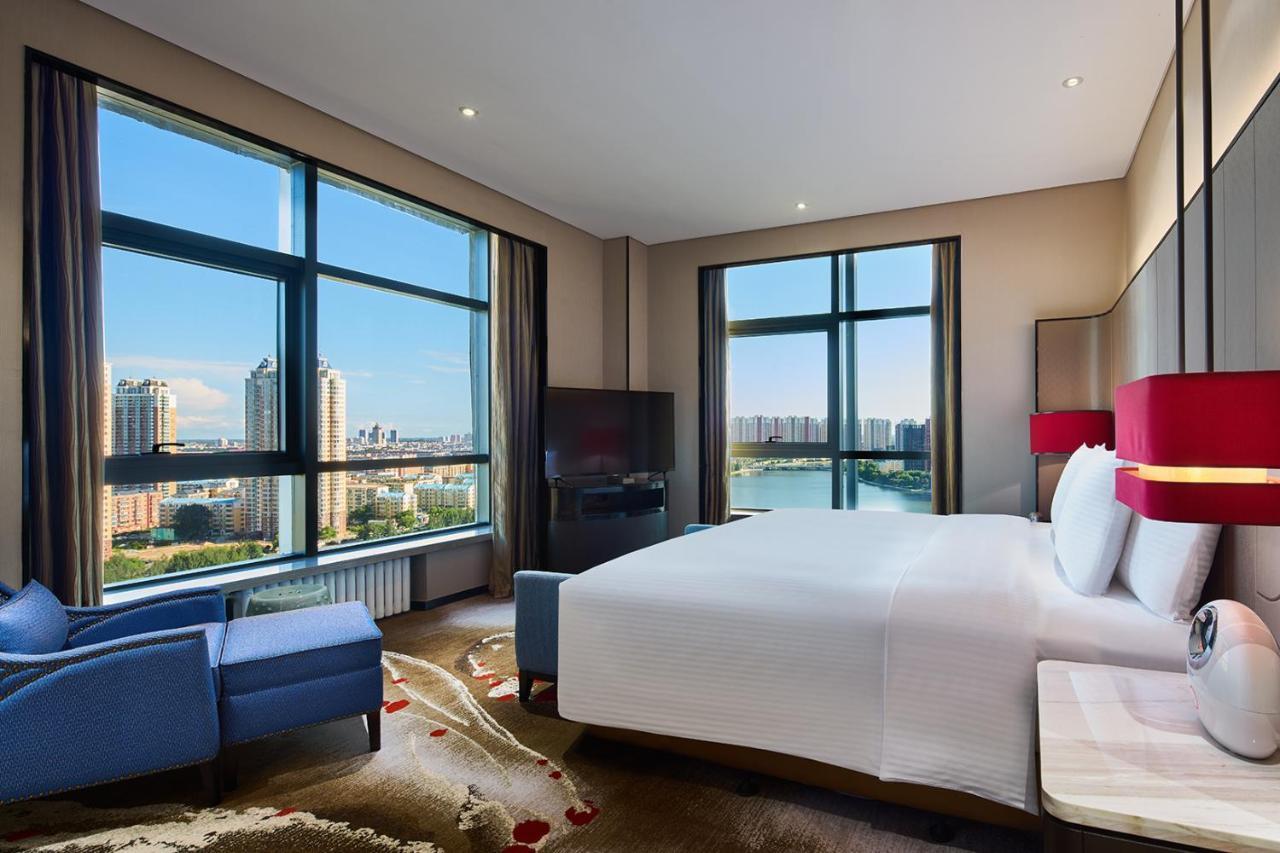 Wanda Realm Qiqihar Hotel Bagian luar foto