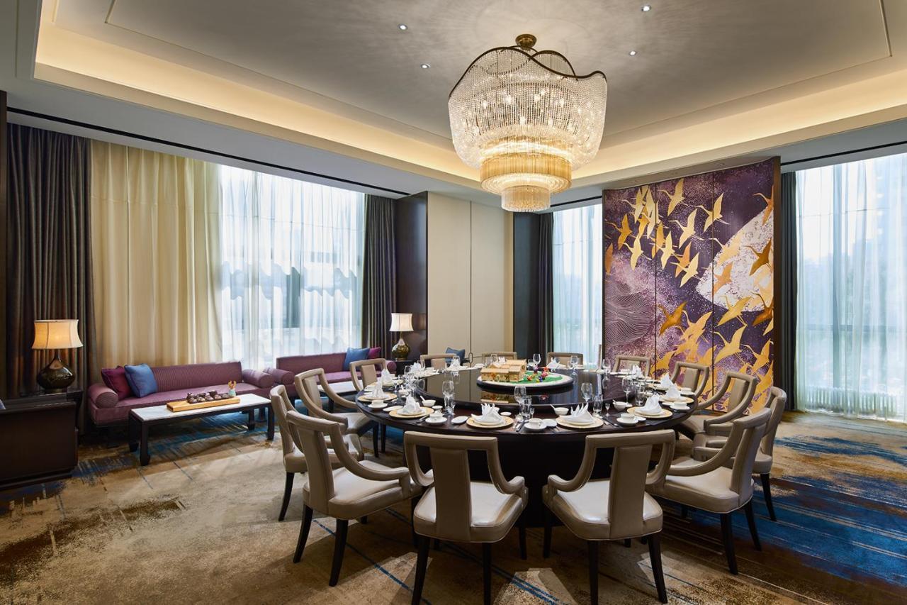 Wanda Realm Qiqihar Hotel Bagian luar foto