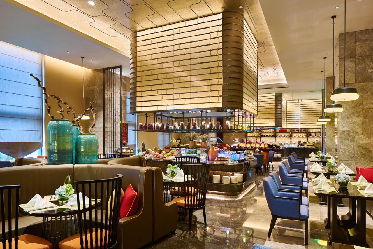 Wanda Realm Qiqihar Hotel Bagian luar foto