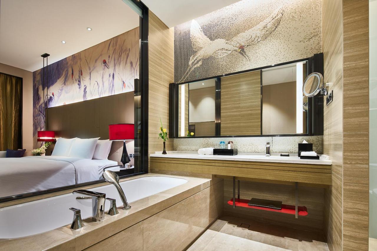 Wanda Realm Qiqihar Hotel Bagian luar foto