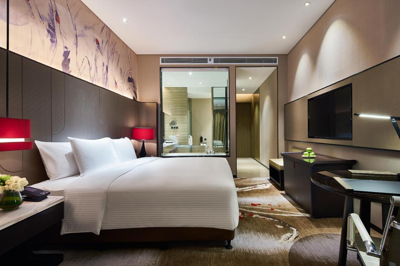 Wanda Realm Qiqihar Hotel Bagian luar foto