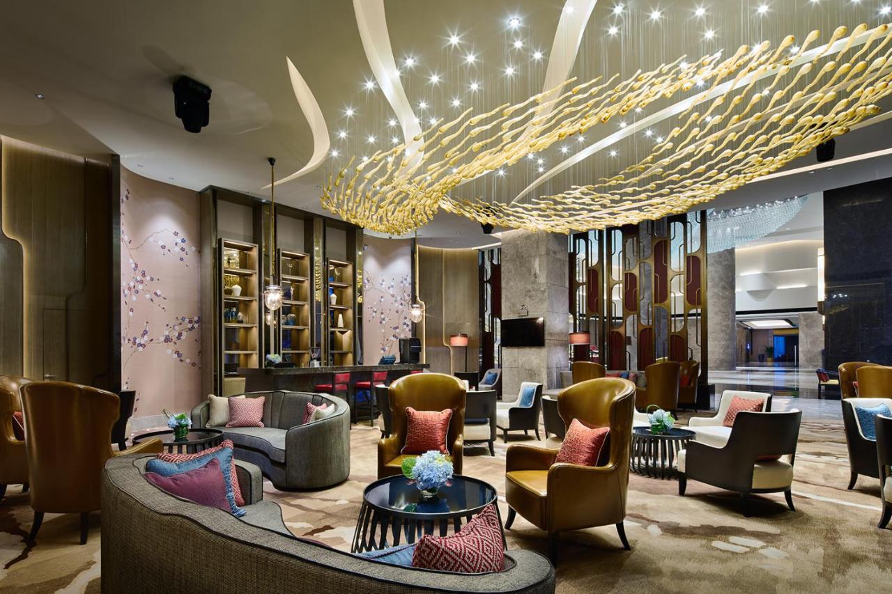 Wanda Realm Qiqihar Hotel Bagian luar foto