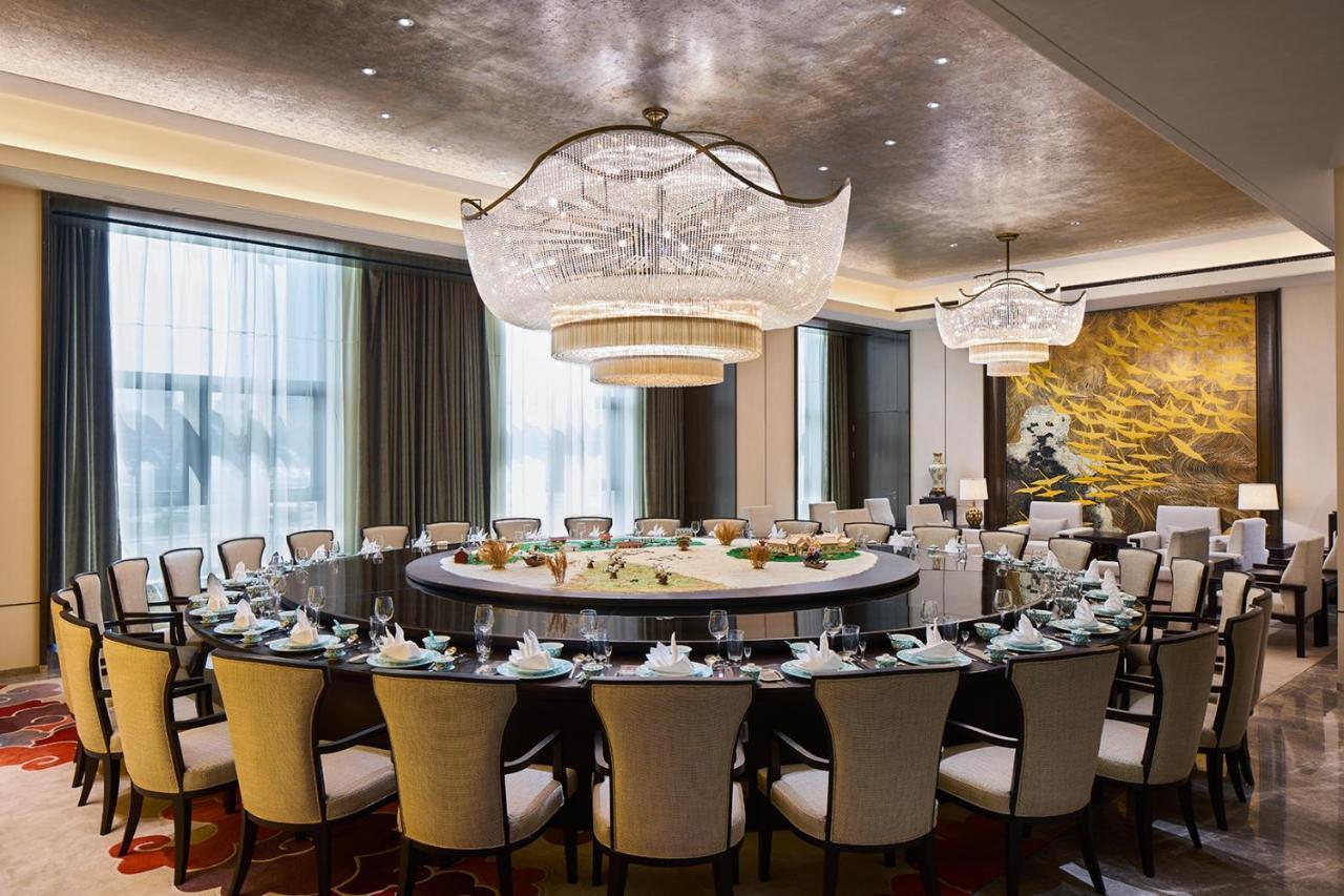 Wanda Realm Qiqihar Hotel Bagian luar foto