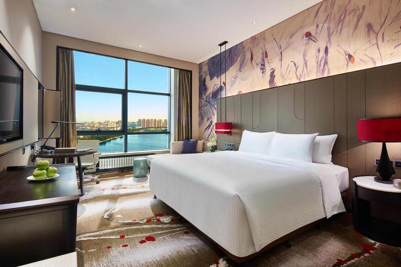 Wanda Realm Qiqihar Hotel Bagian luar foto