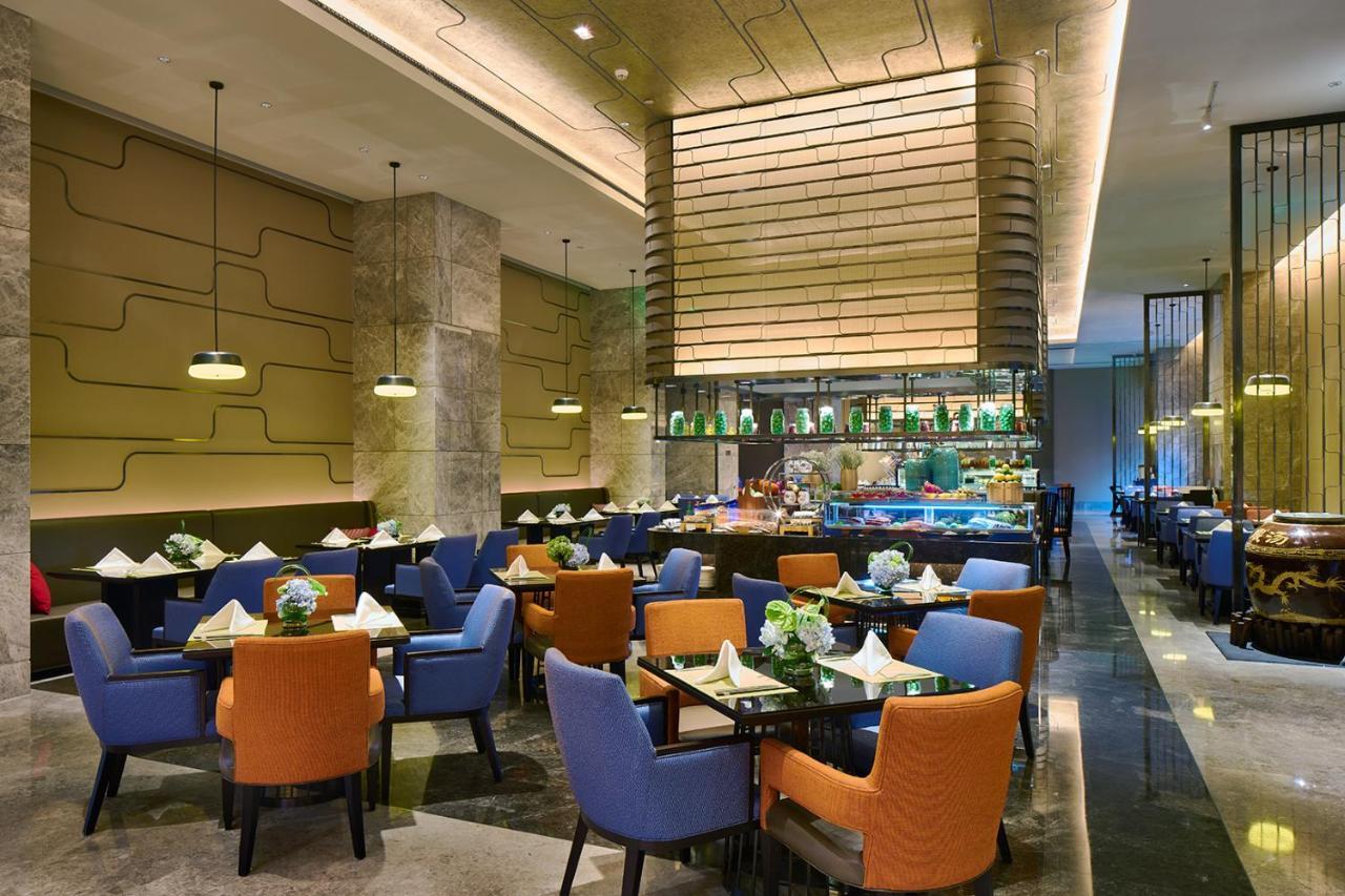 Wanda Realm Qiqihar Hotel Bagian luar foto